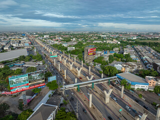 Fototapeta premium Aerial view construction site building of junction city downtown transport road with crane