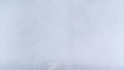 Frozen ice texture frosty surface winter background cold and smooth abstract pattern pale blue color natural chill seasonal clean and fresh