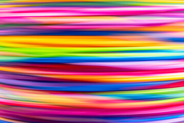 a abstract art piece featuring a dynamic, colorful composition of horizontal, overlapping lines in vivid shades