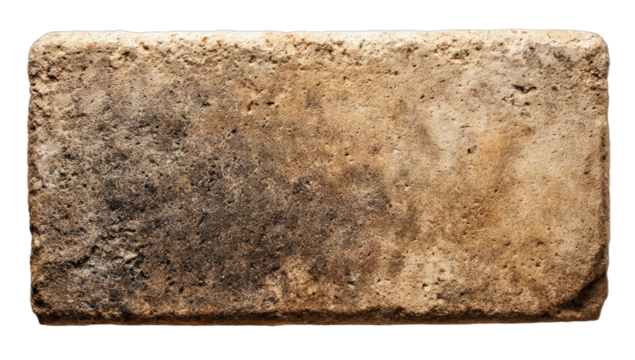 Close-up of a single, rectangular, textured brick with various shades of brown and beige