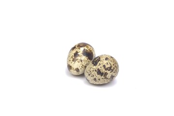 Nice small quail egg isolated on white background