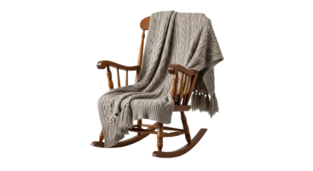 A traditional wooden rocking chair with a high back is elegantly draped with a cozy beige cable-knit throw blanket, evoking a feeling of warmth, comfort, and relaxation