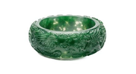 An ornate, wide green jadeite bangle intricately carved with a traditional mythical dragon motif, showcasing exquisite craftsmanship and the beautiful translucent quality of the gemstone