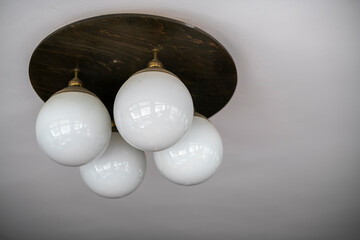 Abandoned lakeside holiday resort with deserted wooden cabins, overgrown vegetation, and decaying buildings reclaimed by nature