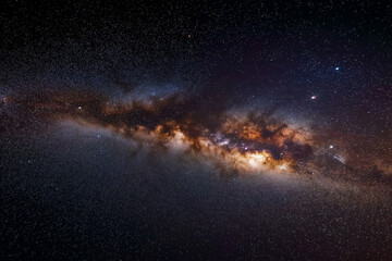 Stunning view of the central bulge of the milky way galaxy filled with countless stars, dust lanes, and nebulae against the deep blackness of outer space, showcasing the grandeur of our cosmic home