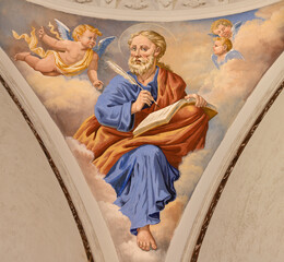 Obraz premium PRAIANO, ITALY - OCTOBER 6, 2025: The fresco of St. Matthew the Evanglist in the side cupola of church Chiesa di san Gennaro by unknown artist of 20. cent. 