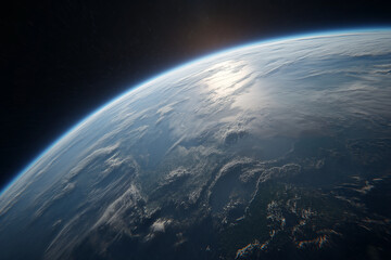 Fototapeta premium Stunning view of planet earth from space showing the curvature of the planet, atmospheric layer, clouds, and the sun reflecting off the surface during sunrise or sunset