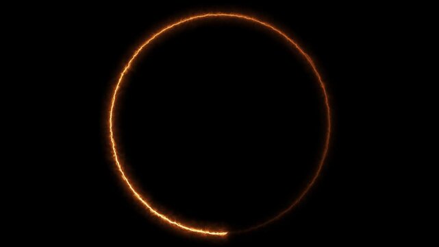 Abstract fiery ring rotates in darkness
