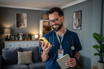 Male doctor using mobile phone, providing telemedicine consultation