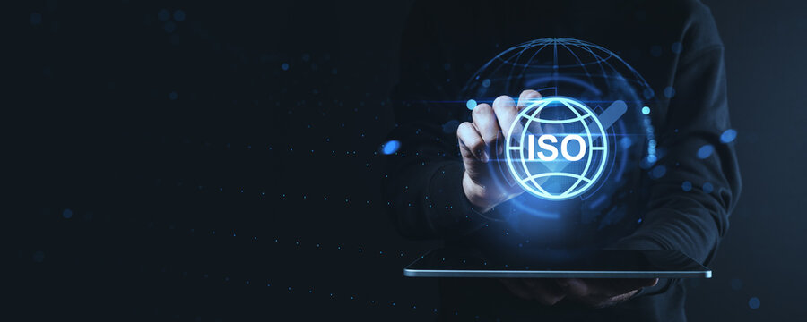 ISO certification digital concept with person interacting with holographic interface on tablet in futuristic creative style on dark background. - Powered by Adobe