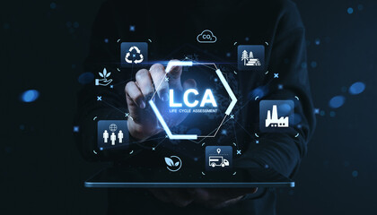 Life Cycle Assessment concept with environmental sustainability icons and digital interface on futuristic screen over dark background with person interaction.