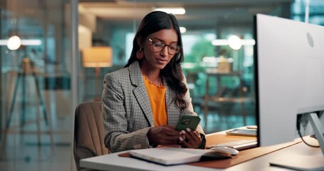 Phone, glasses and businesswoman in office with networking, communication or email on mobile app. Cellphone, computer and female person with contact, texting or social media on break in workplace. - Powered by Adobe