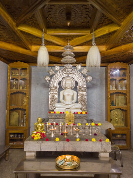 Interiors of a Jain temple and the idols of lord Mahavira and padmavathi, religion, worship, spirituality, Hinduism, decoration in India.