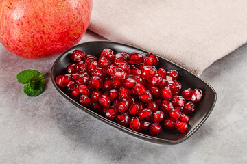 Ripe sweet red pomegranate seeds