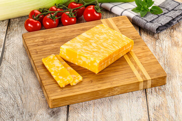 Marble yellow cheese with slices