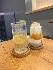 Glass of refreshing lemon and crunchy biscuits drink