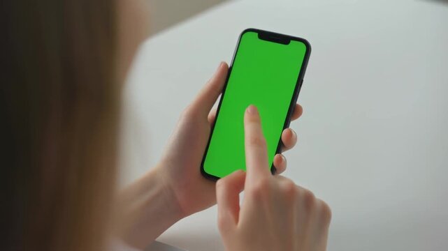 Green Screen video mock up, woman holding celluer