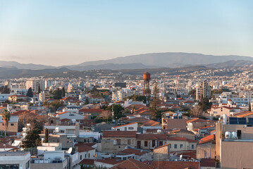Sunset illuminating the coastal city of Limassol, Cyprus, with Troodos mountains in the background