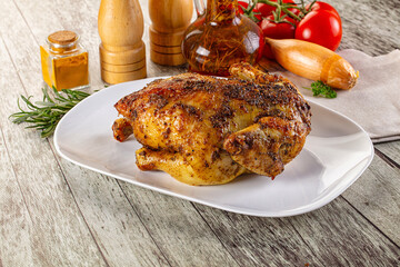 Baked in oven whole chicken with spices