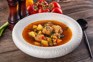 Tomato Soup with meatballs and vegetables