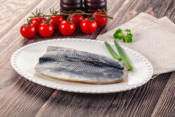 Salted herring fillet with skin