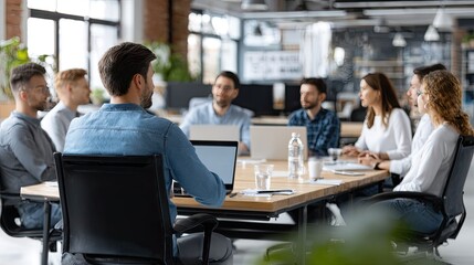 Business Strategy Session: Colleagues gather in a modern office setting, engaged in a dynamic meeting around a conference table. Focused on collaboration and teamwork to drive productivity.