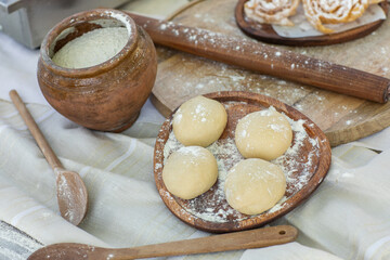 Artisan chef making authentic homemade biscuits following old Moldovan recipes. Heritage baking scene. cozy rural kitchen