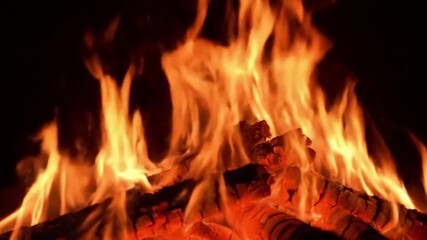 VFX simulation of elemental flames gracefully ascending and dissipating, illustrating raw energy and transformative power. Upward angle following the ethereal rise and fall of the fiery elements.