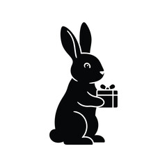 Black rabbit holding gift box silhouette cute animal holiday present isolated on white background