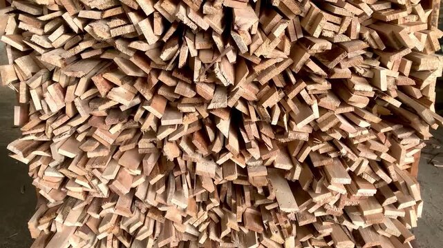 Pile of Wood Scraps - A Close-Up Look at Woodworking Waste.