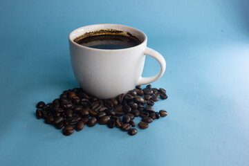 cup of coffee with coffee beans
