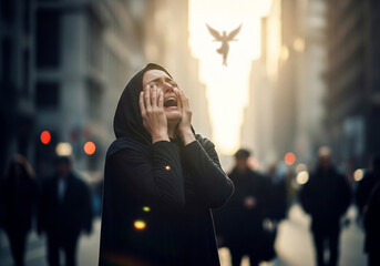 A desperate woman screams in grief and asks God for help, an angel on the street of a gloomy city among a crowd of people.