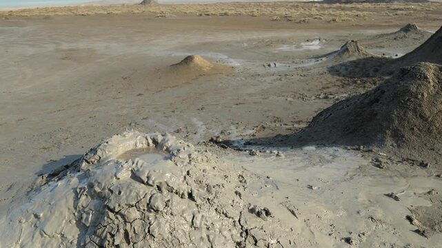 Mud volcanoes in Azerbaijan at Gobustan Nature Reserve near Baku. View of Mud volcano and landscape in Gobustan, Azerbaijan.
