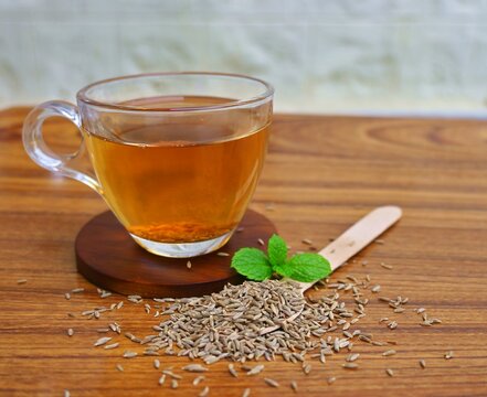 cup of cumin water, jeera water widely used as medicine, traditional Indian medicine 