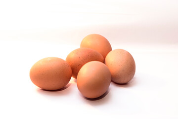 Group of fresh brown eggs