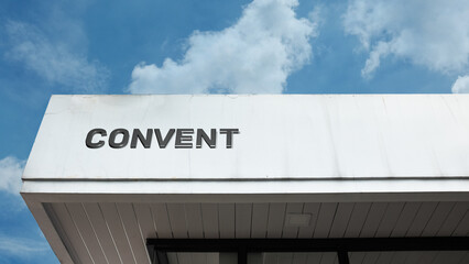 Convent word sign displayed on a building under a clear blue sky, representing religious life, spirituality, faith, devotion, and monastic community facilities