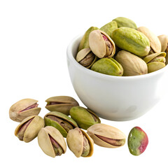 Delicious pistachios spilling from a white bowl
