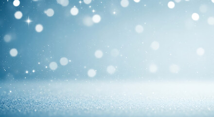 Fototapeta premium Soft blue background with sparkling bokeh effect for winter 