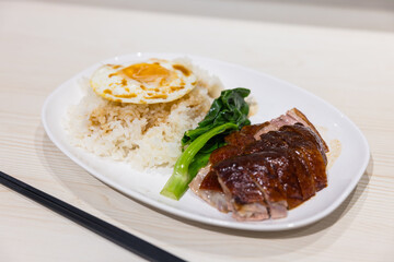 Delicious Cantonese roasted duck rice meal closeup
