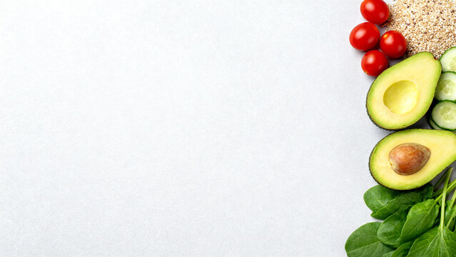 Fresh ingredients for healthy eating including avocado, spinach, tomatoes, and quinoa