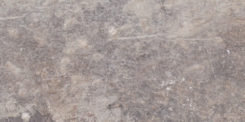 The rough surface of a stone slab with a concrete hue. Design for porcelain tiles