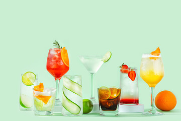 Alcoholic cocktails against a light green background.