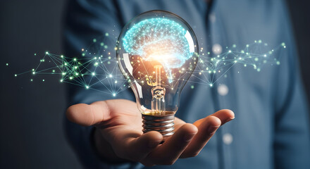 Illuminated Light Bulb with Glowing Brain Inside Symbolizing Innovation and Ideas.