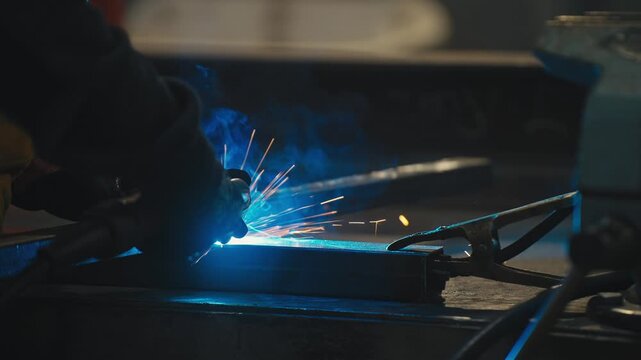 Welding Sparks Flying from Metal Frame