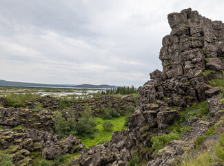 rock formations and grass field in Iceland