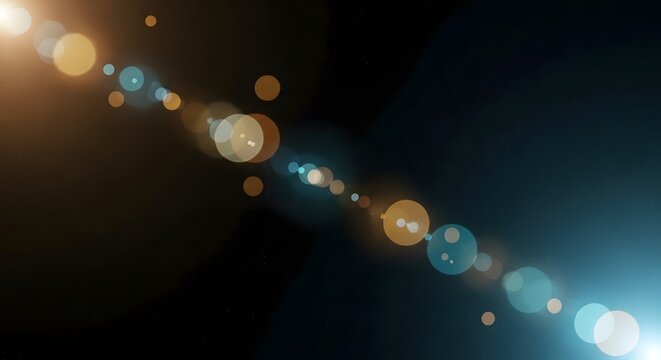 Abstract lens flare effect with bokeh lights on dark background.
