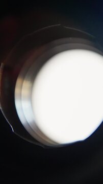 closeup lens, glowing circular frame, circle with gentle shining ring, radiant round shape encircled by luminous border reflection, brightly lit circular form with soft halo and reflective rim surface