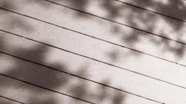Cobblestone diagonal pattern with soft shadows and natural light.
