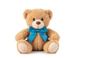Obraz premium Cute fluffy brown teddy bear with blue bow isolated on white background