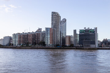 Fototapeta premium Riverfront skyline of modern residential towers and apartments